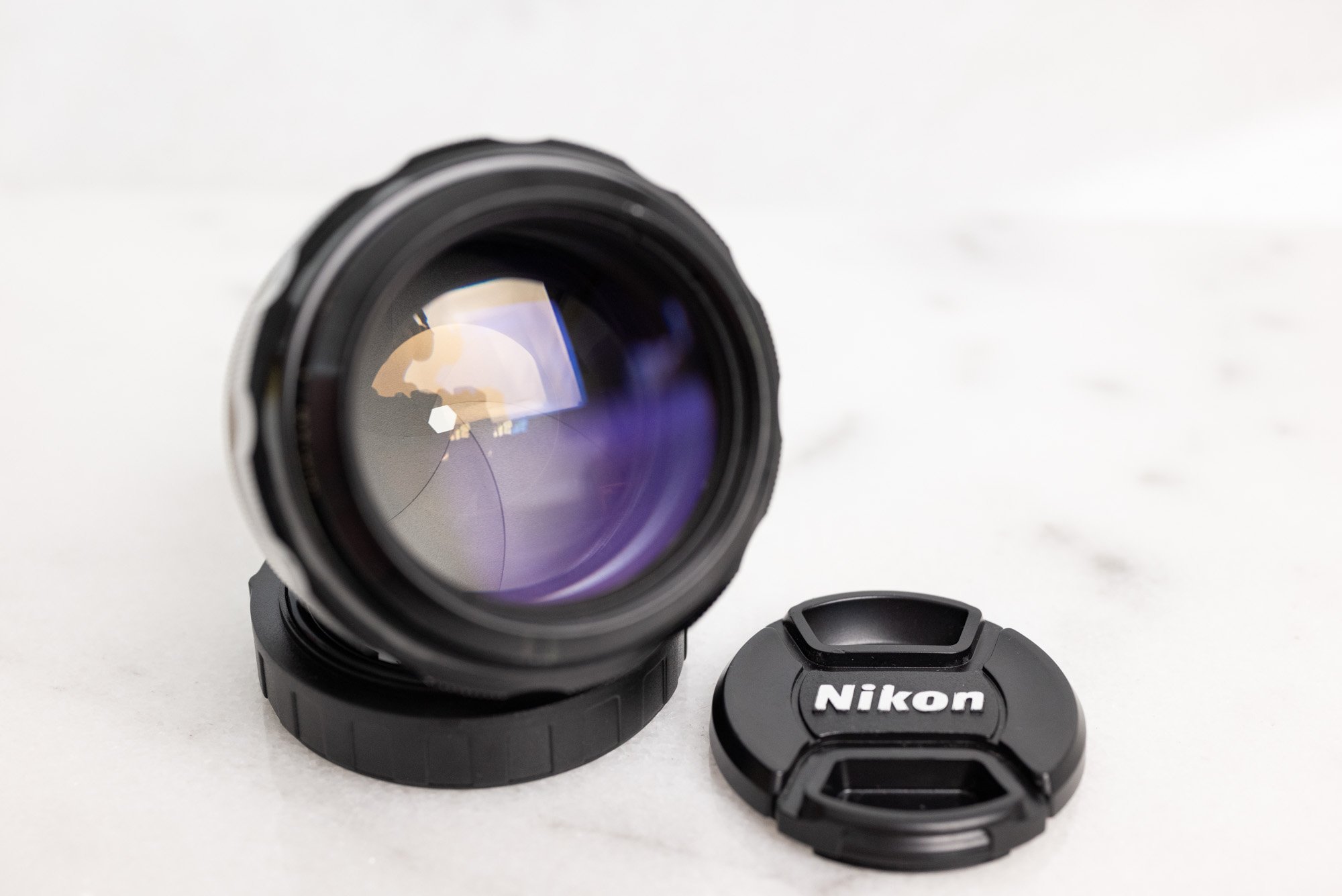 Nikon Nikkor H Auto 85mm F/1.8 Pre AI Fast Prime Lens with Nikon Nikkor H Auto 85mm F/1.8 Pre AI Fast Prime Lens with
